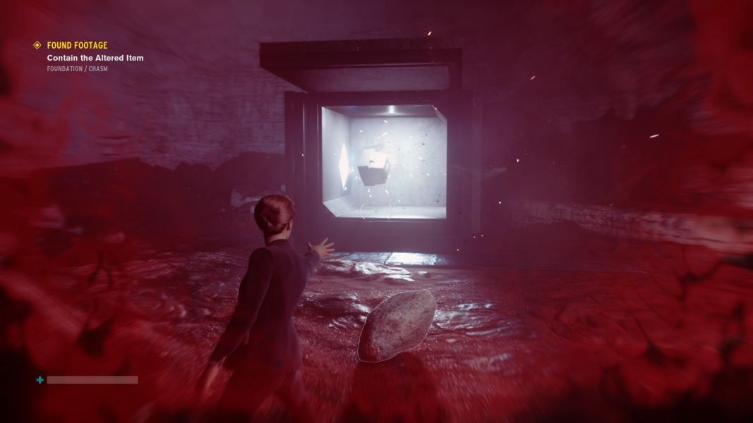 Jesse throws the TV into a containment box.