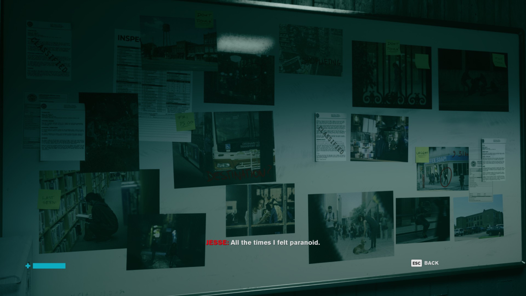 A whiteboard with photographs of Jesse stuck to it.