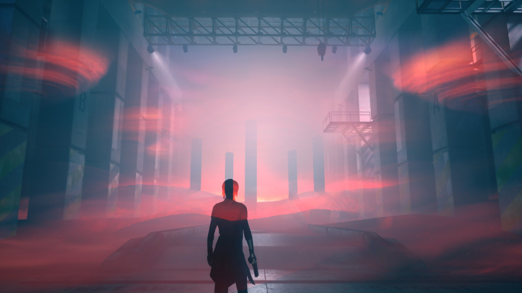 Jesse stands in front of a vision of Slidescape-36.