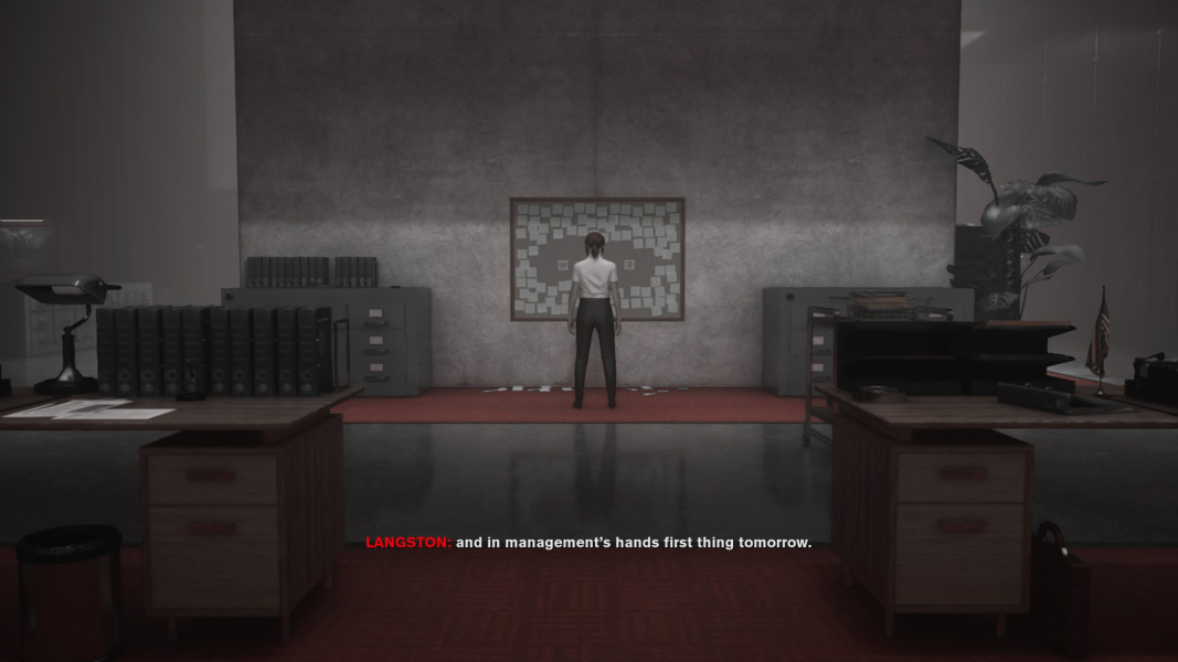 Jesse stands in front of a taskboard with tasks pinned to it.