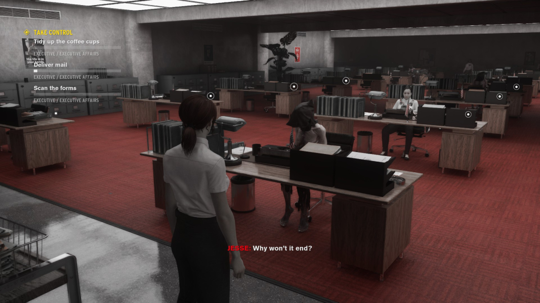 A Hiss sits at a desk, pretending to do office work.