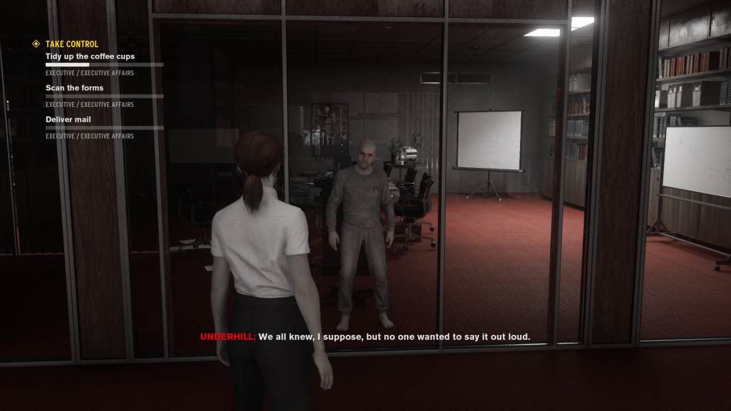 Dylan wordlessly stares at Jesse from one of the offices.