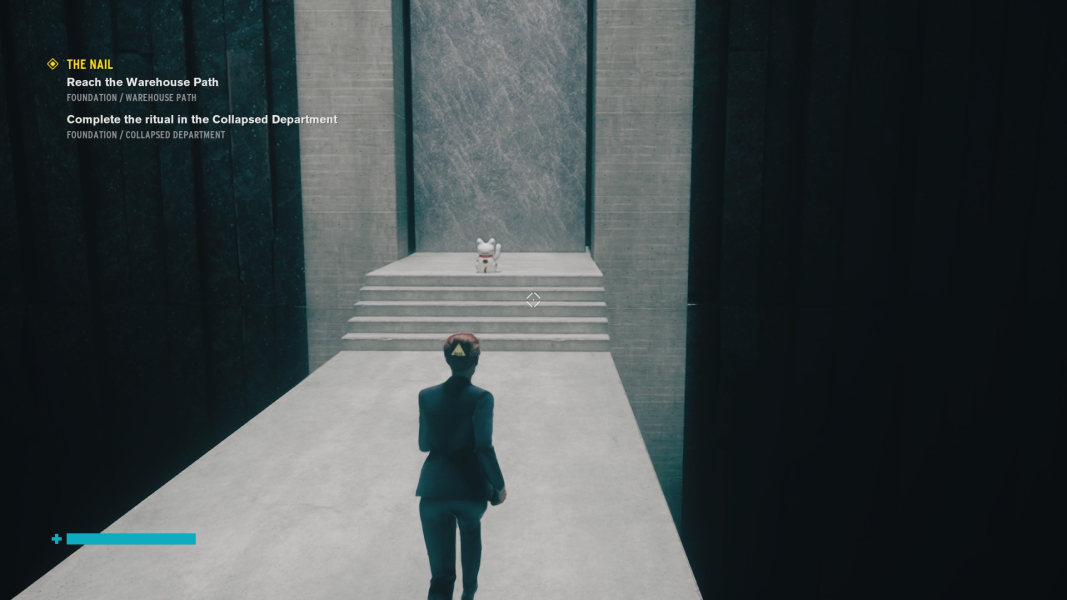 A white maneki-neko sits in front of one of the Firebreak doors.